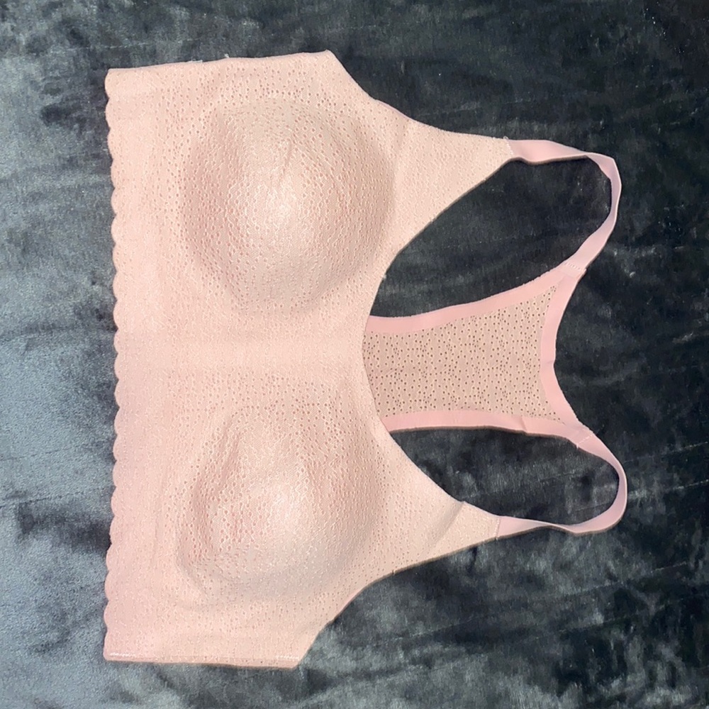 Pastel pink pull over sports bra